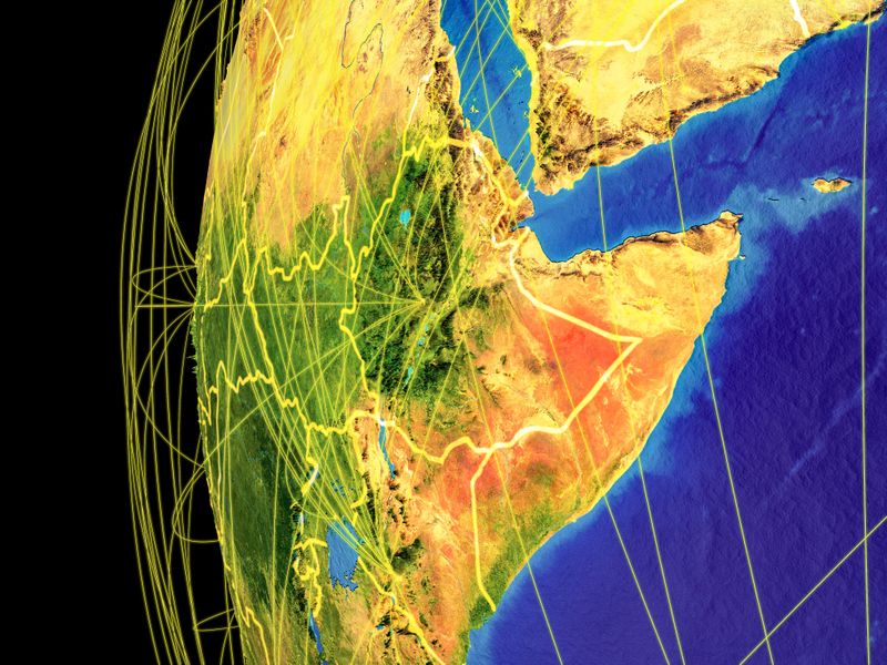 Horn of Africa from space on planet Earth with lines representing global communication, travel, connections. 3D illustration. Elements of this image furnished by NASA.