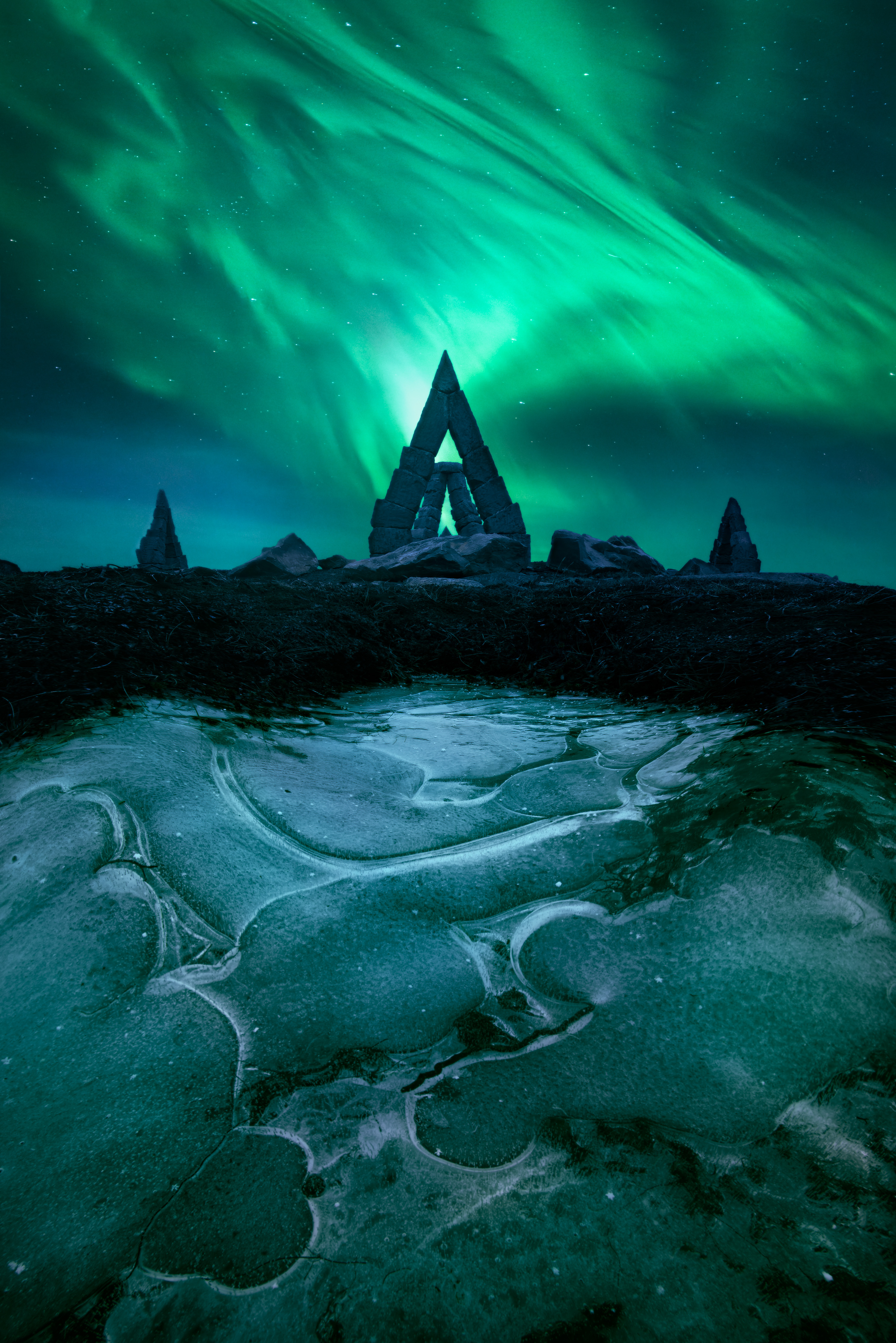 Arctic Gates - The Northern Lights over the mammoth sundial Arctic Henge, which is inspired by Norse mythology.