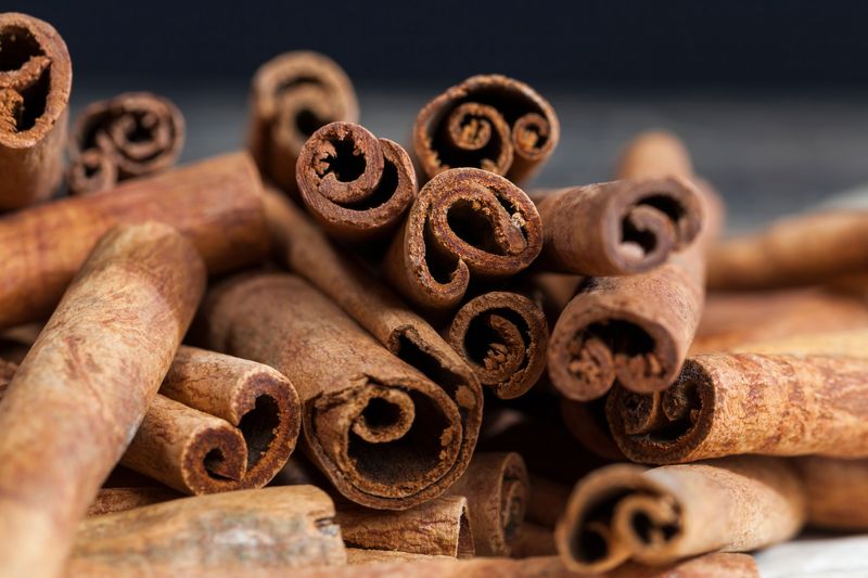 aromatic solid cinnamon used to make aromatic and delicious spices for baking rolls and cooking other dishes, close-up of whole cinnamon sticks