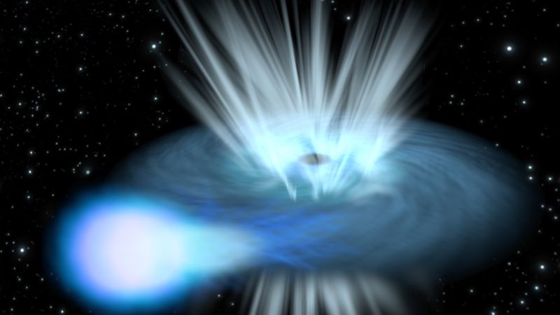 Artist's impression depicting a compact object – either a black hole or a neutron star – feeding on gas from a companion star in a binary system.  Since gas cannot fall in from all directions in a rotating system, it forms a swirling disc around the compact object. 