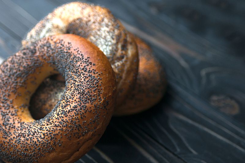 photograph of 3 poppy seed bagels