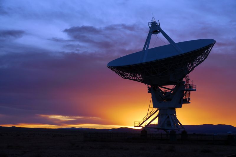 Radio telescope at sunset