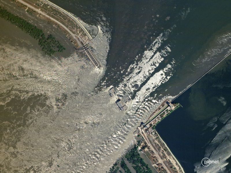 SkySat images capture water spilling over the Nova Kakhovka dam in southern Ukraine on 6 June 2023.