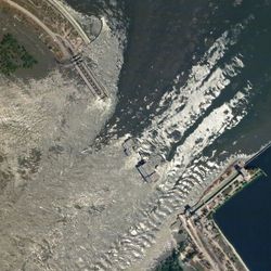 SkySat images capture water spilling over the Nova Kakhovka dam in southern Ukraine on 6 June 2023.