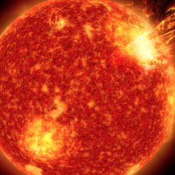 The Sun seeing release plasma into space as well as a flare on its surface.