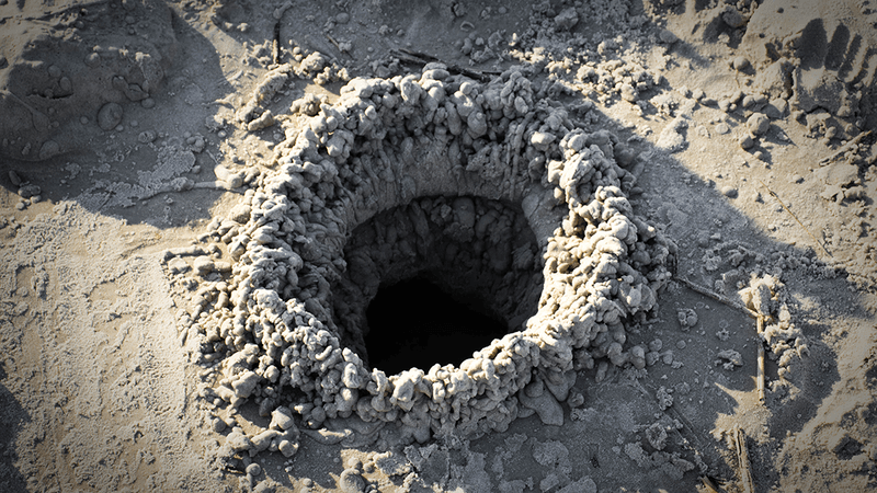 A hole on a beach.