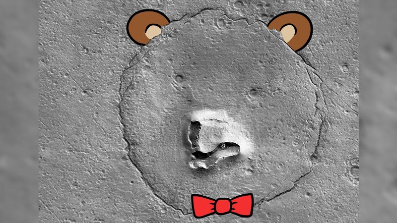 The crater in the story with added cartoon ears and a red bowtie