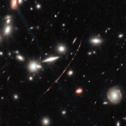 A zoomed in image of the galaxy cluster shows a treadlike arc of light punctuated by bright dots, the graviationally lensed image of Earendel