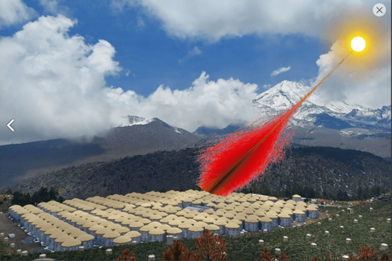 Composite image showing a photograph of the High-Altitude Water Cherenkov Observatory in Mexico observing particles, whose paths are shown as red lines, generated by high-energy gamma rays from the sun