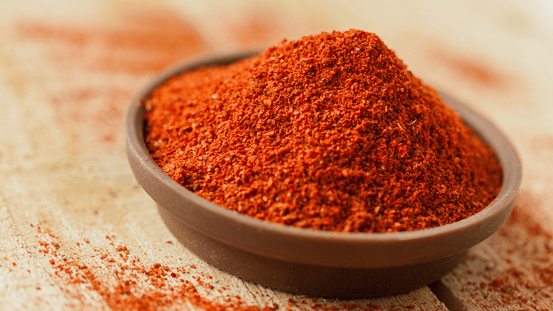 Paprika powder in a spice bowl.