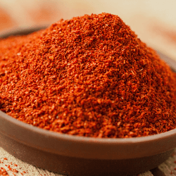 Paprika powder in a spice bowl.