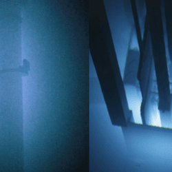 Tubes submersed in water are glowing due to cherenkov radiation.