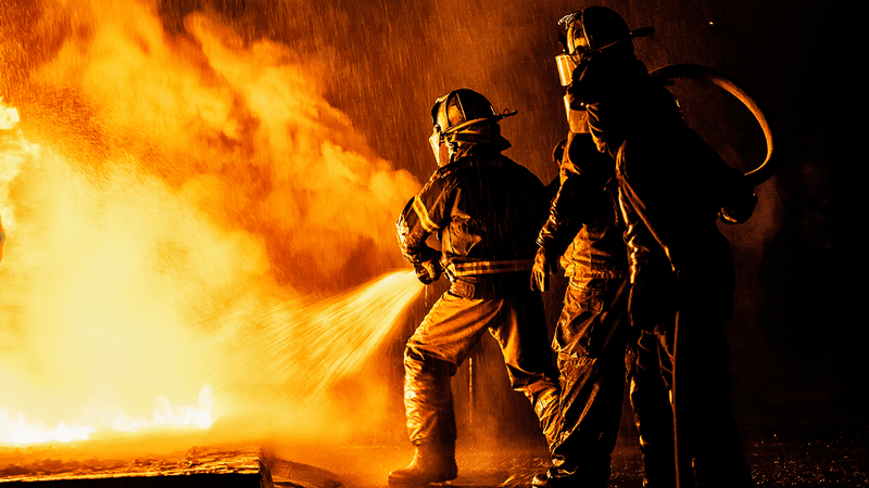 Firefighters putting out a fire.
